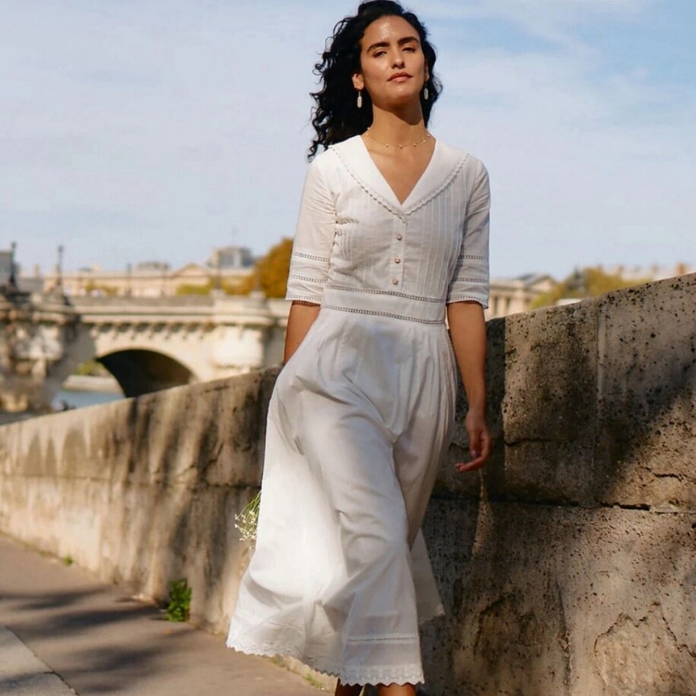 Elegant White Midi Dress with V-Neck and Button Detail